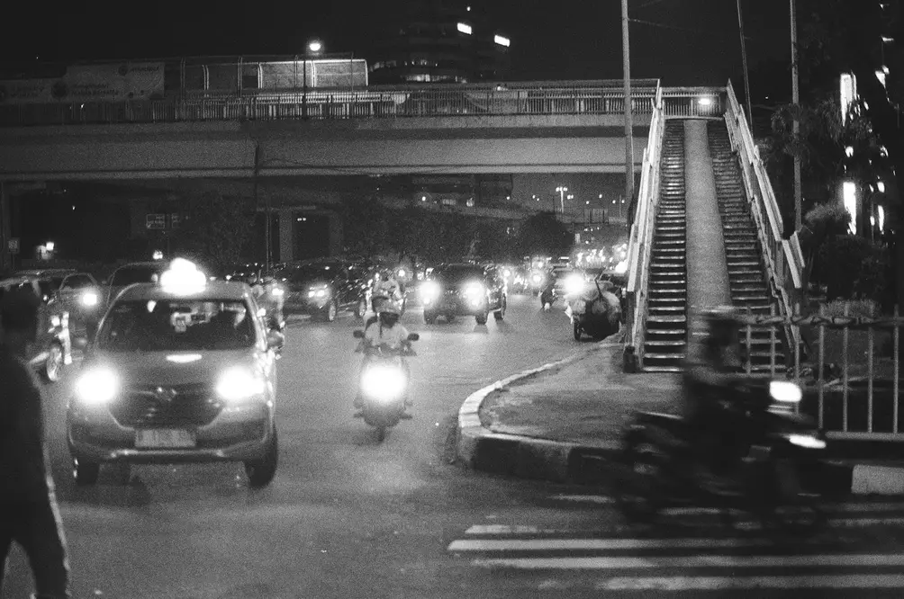 Night Traffic Under the Overpass in Black and White