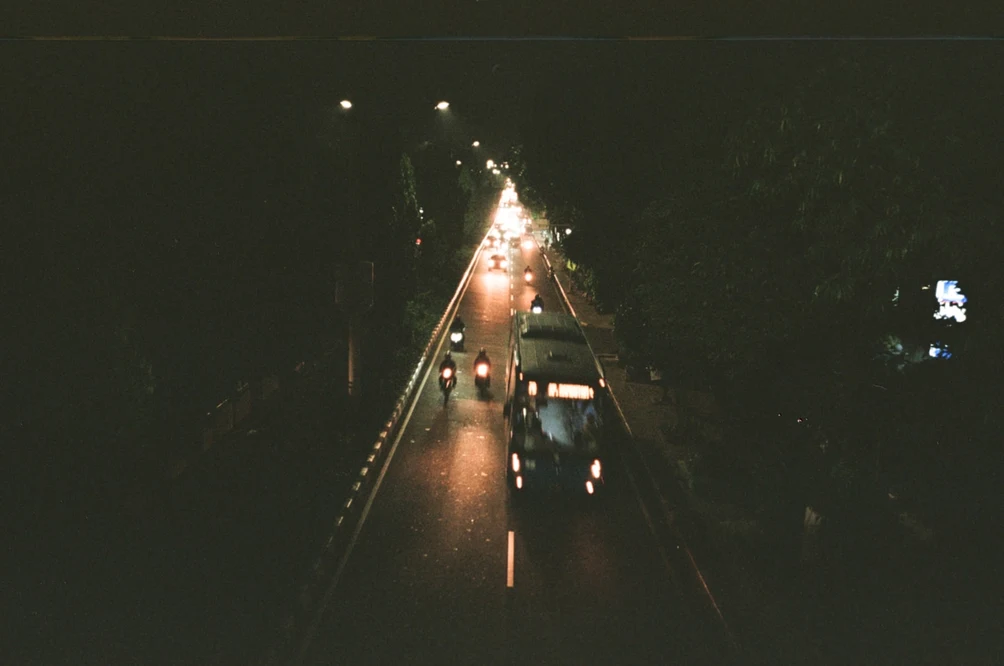 Jakarta Night Traffic from Overpass. Shot with Olympus Mju I, Kodal Gold 200 film