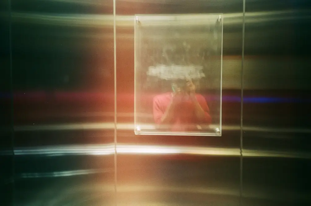 Blurred Reflection in Elevator Mirror