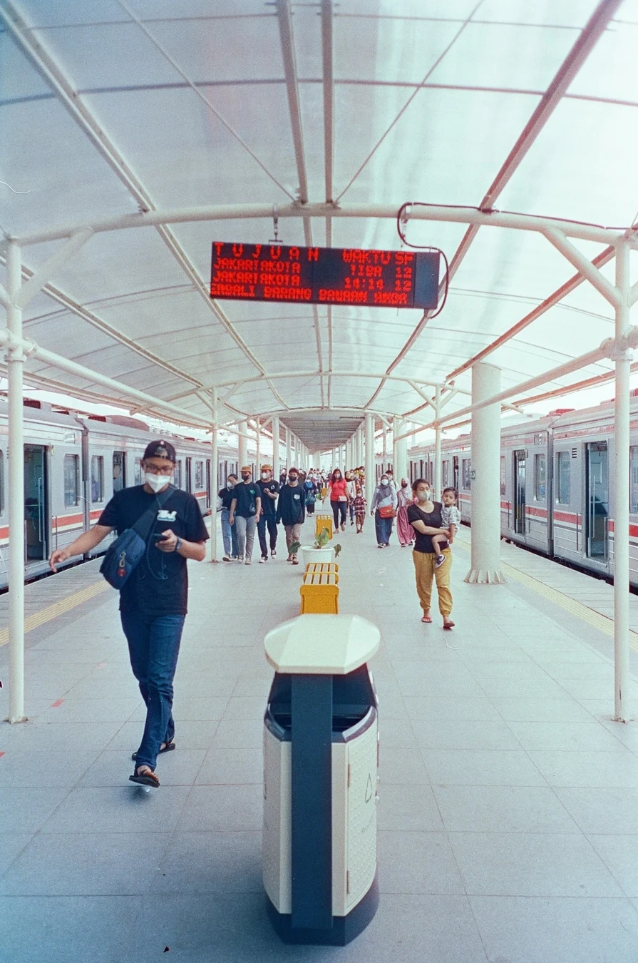 Commuters Walking Through Transit Station. Shot with Olympus Mju II, Hoasca 800 film