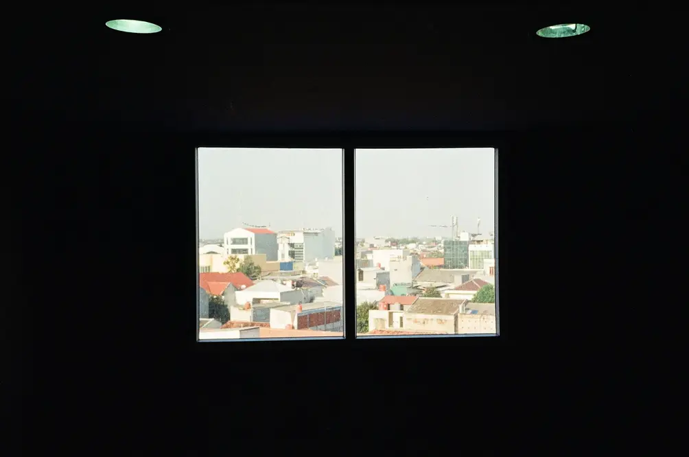 Cityscape Framed Through a Window